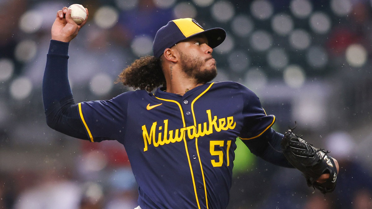 Milwaukee Brewers starting pitcher Freddy Peralta (51) throws against the Atlanta Braves in the third inning at Truist Park.