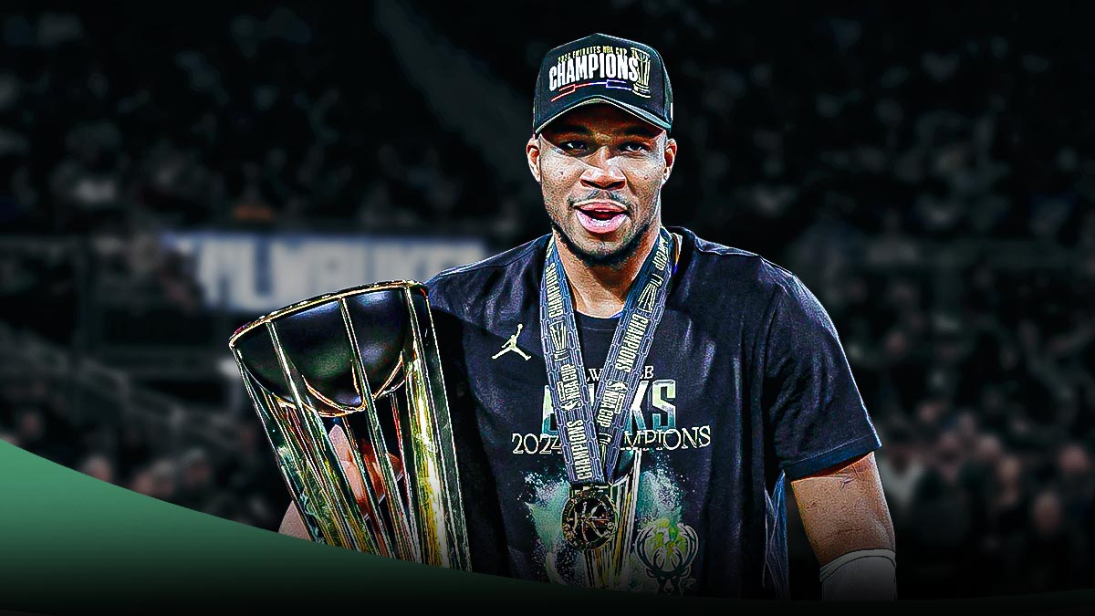 Bucks' Giannis Antetokounmpo holding the 2024 NBA Cup trophy