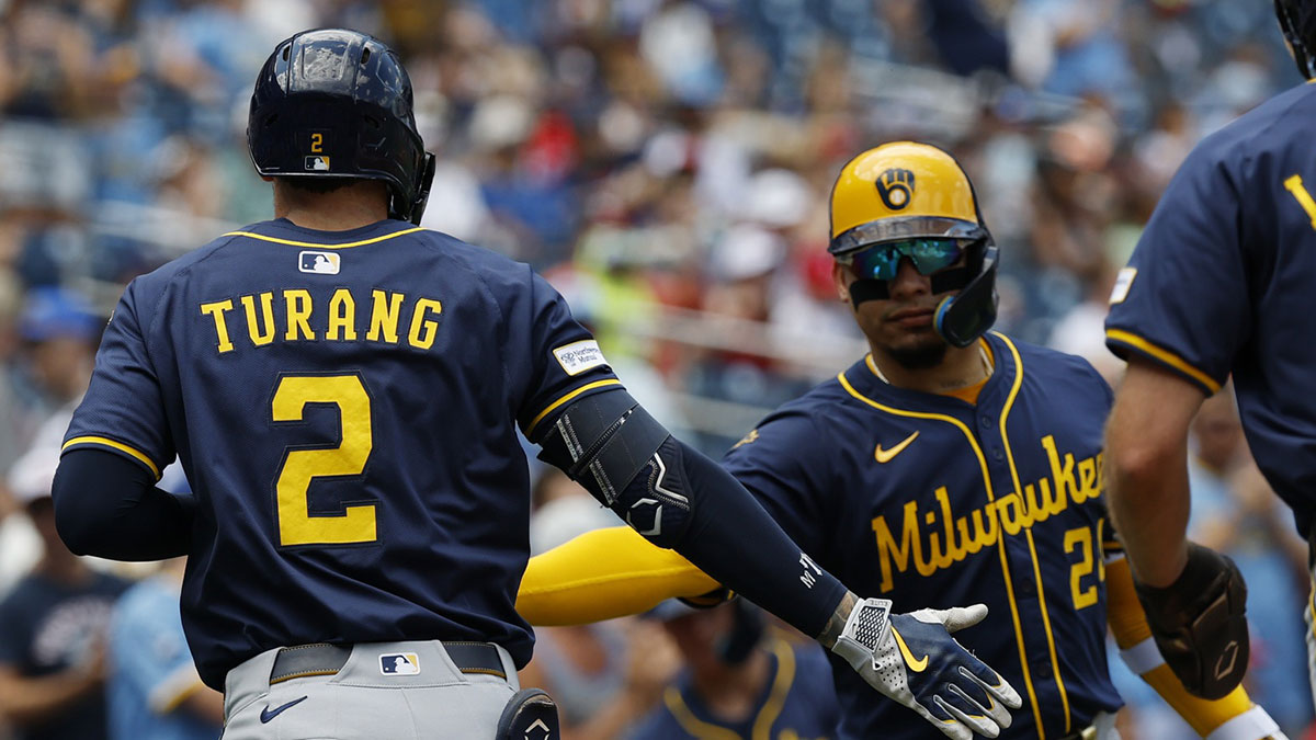 Milwaukee Brewers second baseman Brice Turang (2) celebrates with Brewers catcher William Contreras (24) after hitting a two run home run against the Washington Nationals during the second inning at Nationals Park.