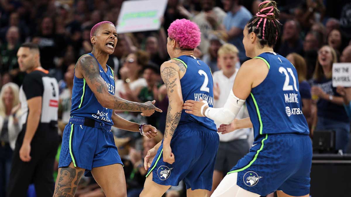 Minnesota Lynx guard Courtney Williams (10) celebrates with guard Natisha Hiedeman (2) during the first quarter against the New York Liberty at Target Center.