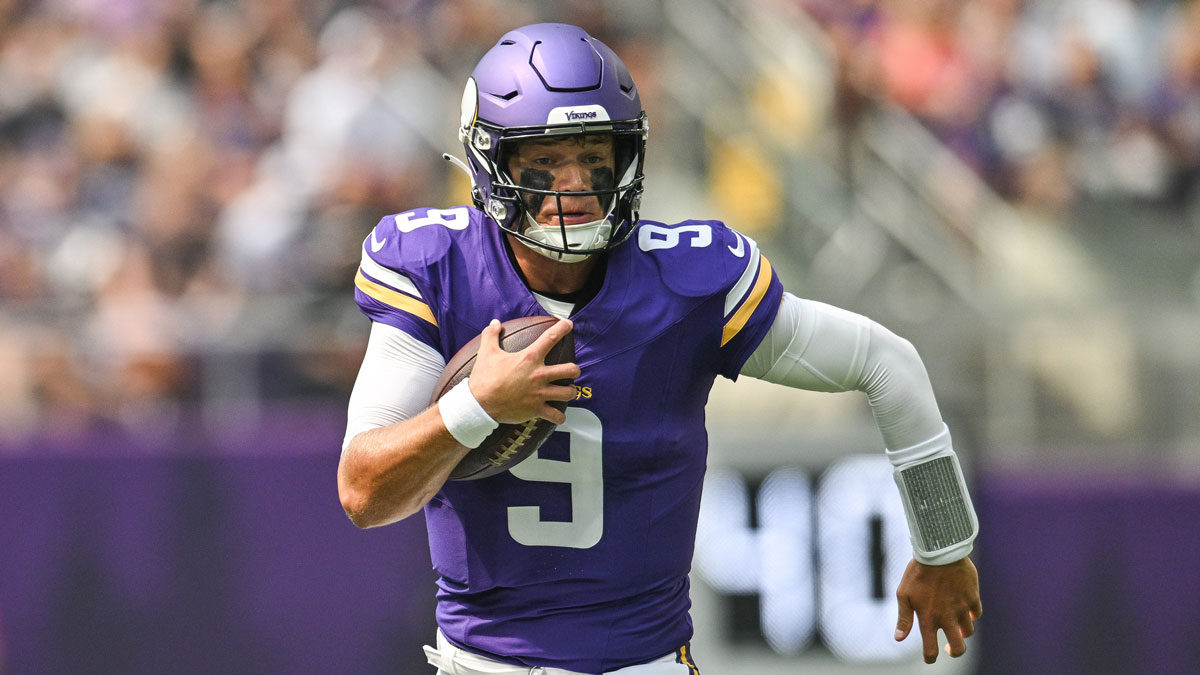 Minnesota Vikings quarterback J.J. McCarthy (9) scrambles for a gain against the Houston Texans during the first quarter at U.S. Bank Stadium. Mandatory Credit: Jeffrey Becker-Imagn Images