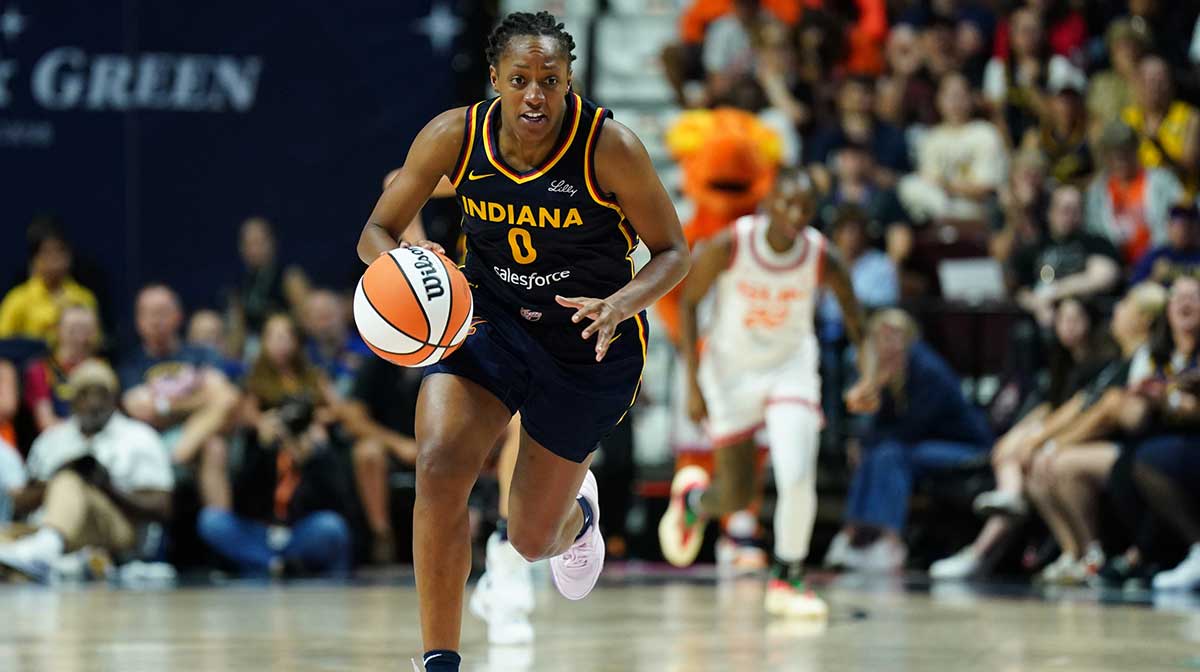 Indiana Fever guard Kelsey Mitchell (0) returns the ball against the Connecticut Sun in the second half at Mohegan Sun Arena.