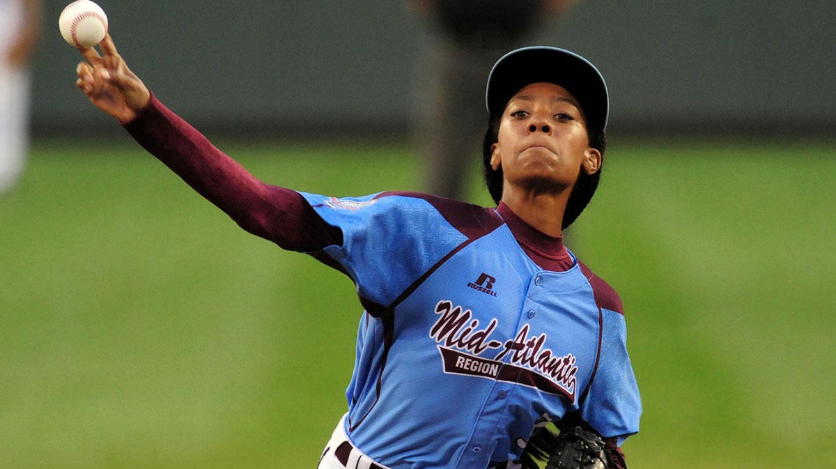 Aug 20, 2014; South Williamsport, PA, USA; Mid-Atlantic Region pitcher Mo'ne Davis (3) throws a pitch in the first inning against the West Region at Lamade Stadium. 