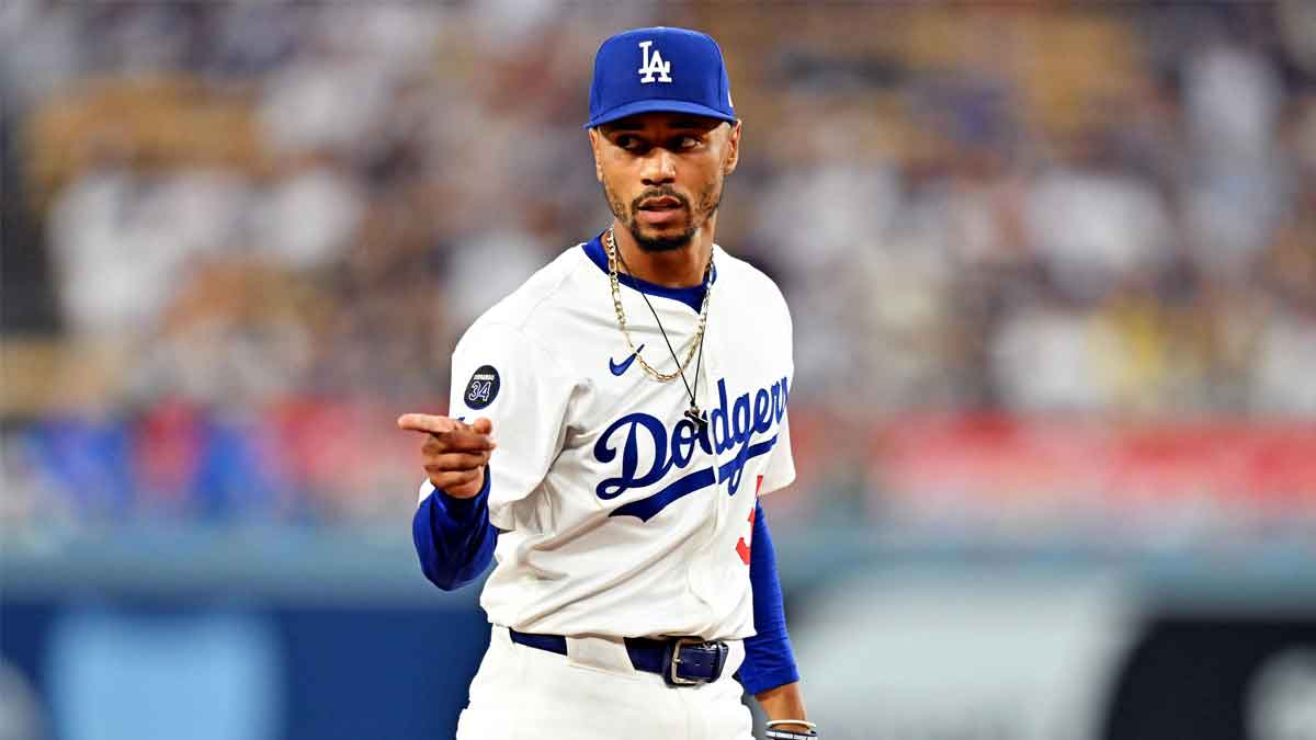 Los Angeles Dodgers shortstop Mookie Betts (50) reacts after making a play during the third inning against the St. Louis Cardinals at Dodger Stadium.