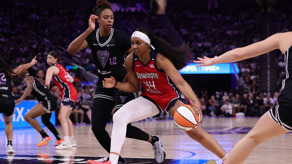 Washington Mystics forward Kiki Iriafen (44) drives in against Golden State Valkyries center Iliana Rupert (12) during the second quarter at Chase Center.