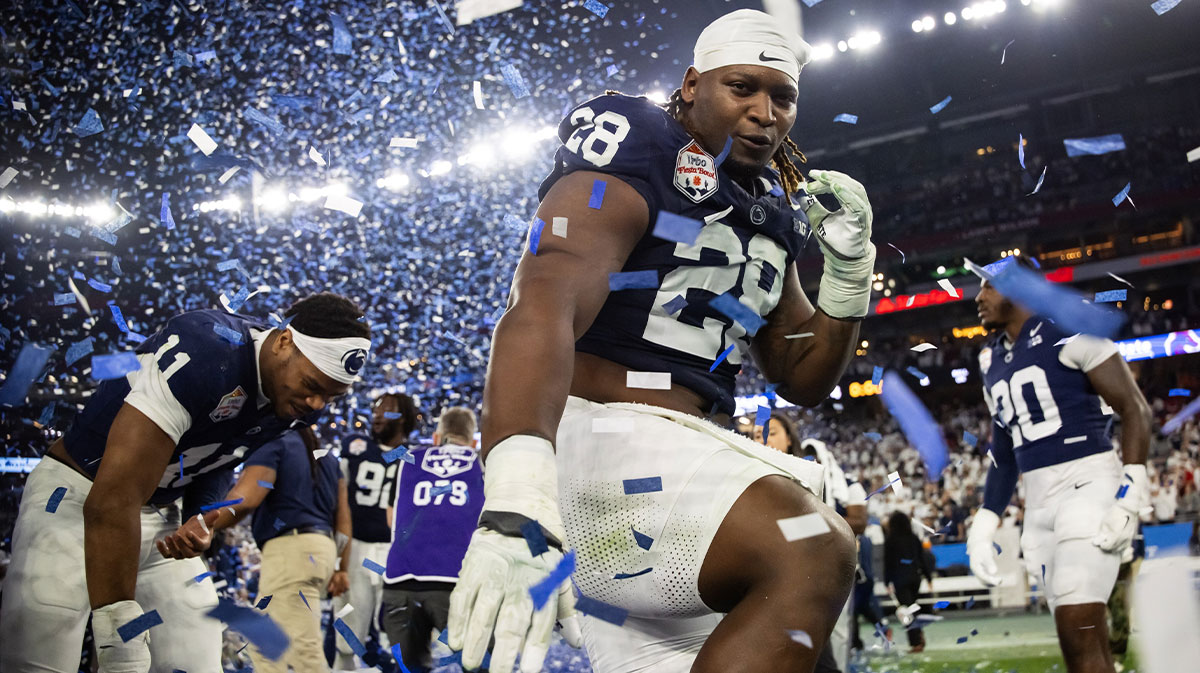 Penn State Nittany Lions defensive tackle Zane Durant (28) celebrates with the Heisman pose after defeating the Boise State Broncos during the Fiesta Bowl at State Farm Stadium.