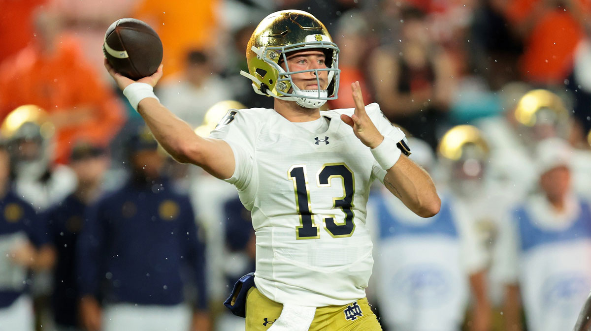 Miami Gardens, Florida, USA; Notre Dame Fighting Irish quarterback CJ Carr (13) drops back to pass against the Miami Hurricanes during the first quarter at Hard Rock Stadium.