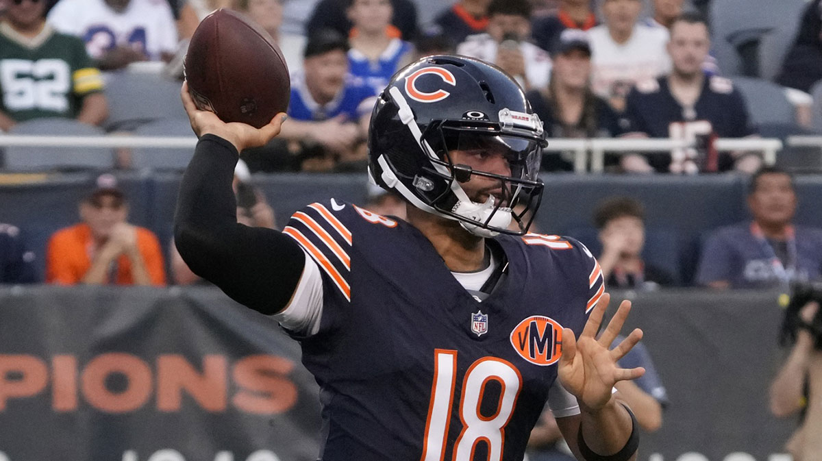 Chicago Bears quarterback Caleb Williams (18) looks to pass the ball against the Buffalo Bills during the first quarter at Soldier Field.