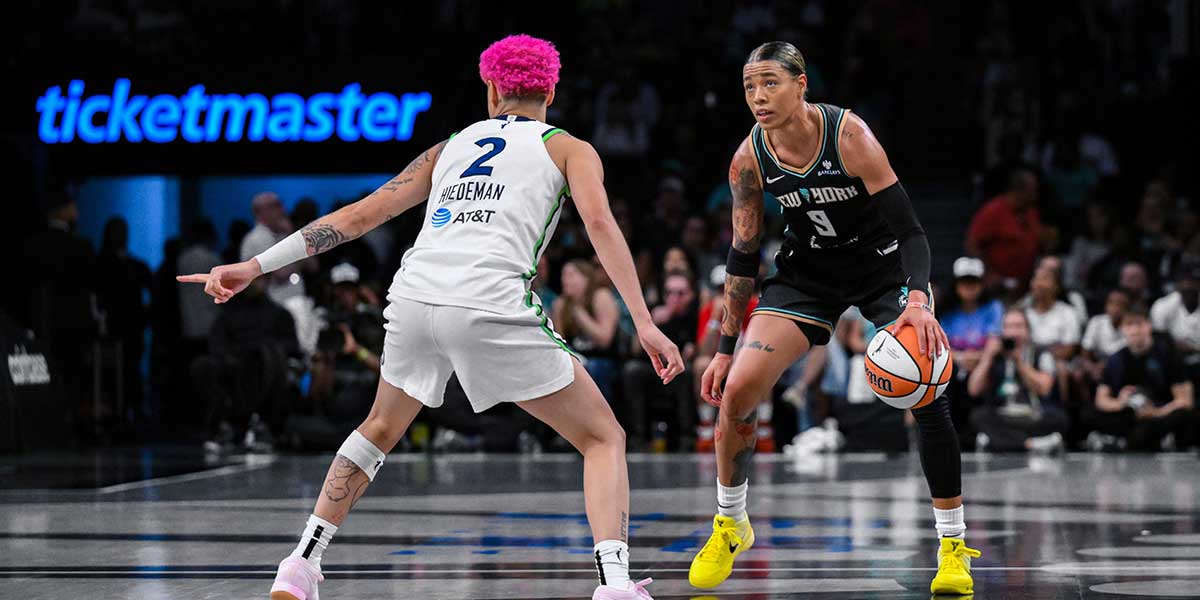 New York Liberty guard Natasha Cloud (9) dribbles against Minnesota Lynx guard Natisha Hiedeman (2) during the first half at Barclays Center.