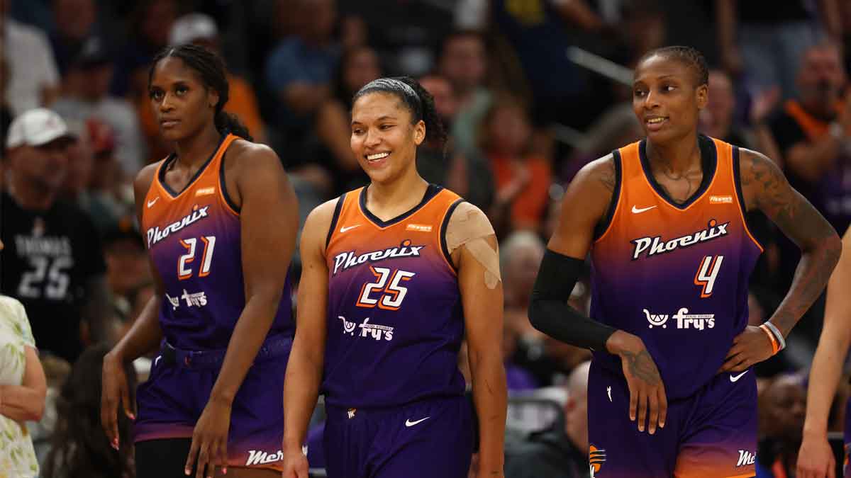 Phoenix Mercury forward Alyssa Thomas (25) with center Kalani Brown (21) and forward Natasha Mack (4) against the Indiana Fever during WNBA game at PHX Arena.