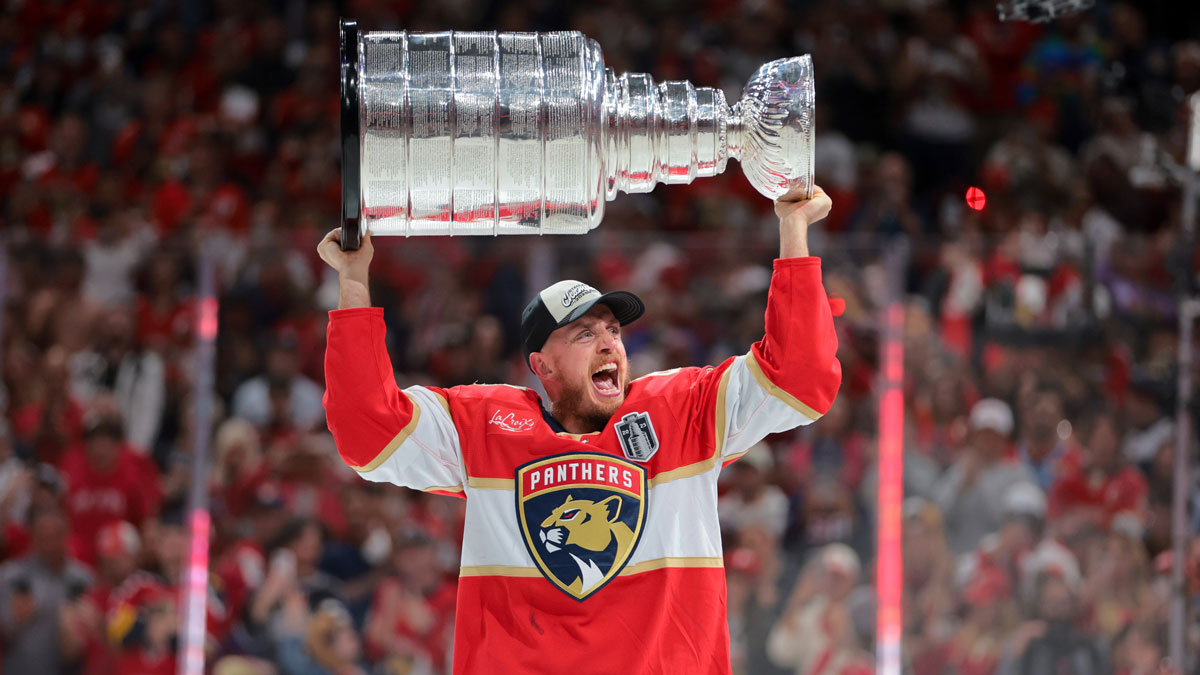 Florida Panthers defenseman Nate Schmidt (88) hoists the Stanley Cup after winning game six of the 2025 Stanley Cup Final against the Edmonton Oilers at Amerant Bank Arena