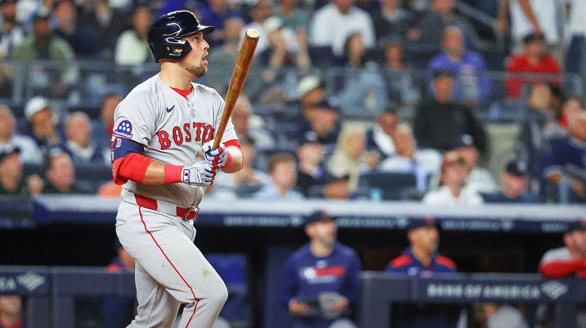 Boston Red Sox first baseman Nathaniel Lowe (37) hits a run scoring sacrifice fly in the fifth inning against the New York Yankees at Yankee Stadium.