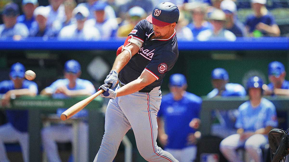 Washington Nationals first baseman Nathaniel Lowe (33) hits a grand slam during the first inning against the Kansas City Royals at Kauffman Stadium.