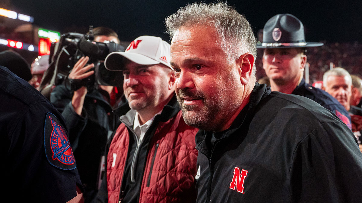 Nebraska Cornhuskers head coach Matt Rhule and athletic director Troy Dannen walk off the field after defeating the Wisconsin Badgers at Memorial Stadium.
