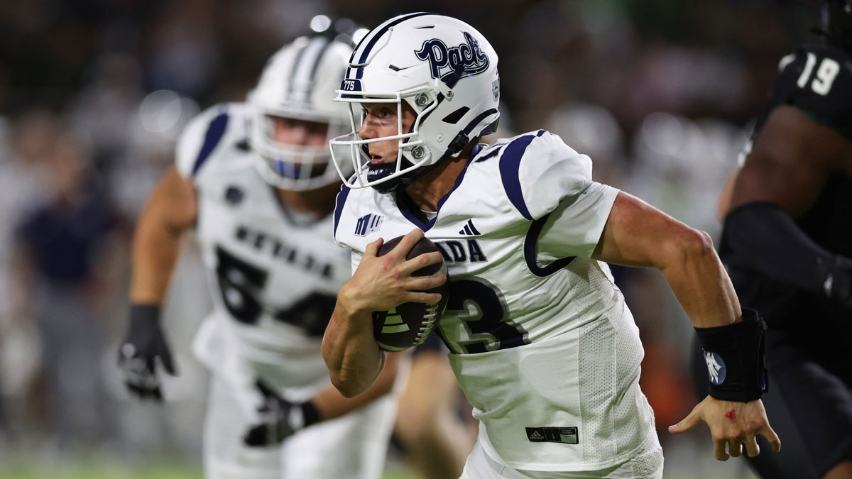 Nevada Wolf Pack quarterback Chubba Purdy (13) gains yards against the Hawaii Rainbow Warriors during the third quarter at the Clarence T.C. Ching Athletics Complex.
