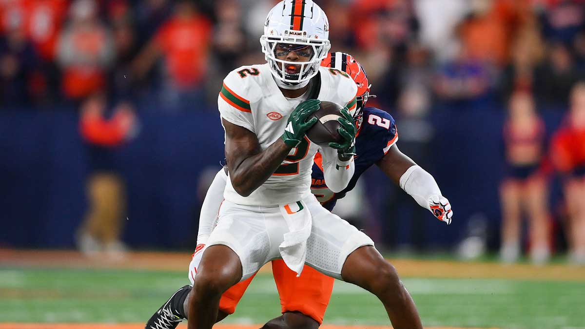 Miami Hurricanes wide receiver Isaiah Horton (2) catches the ball against Syracuse Orange linebacker Marlowe Wax (2) during the second half at the JMA Wireless Dome.