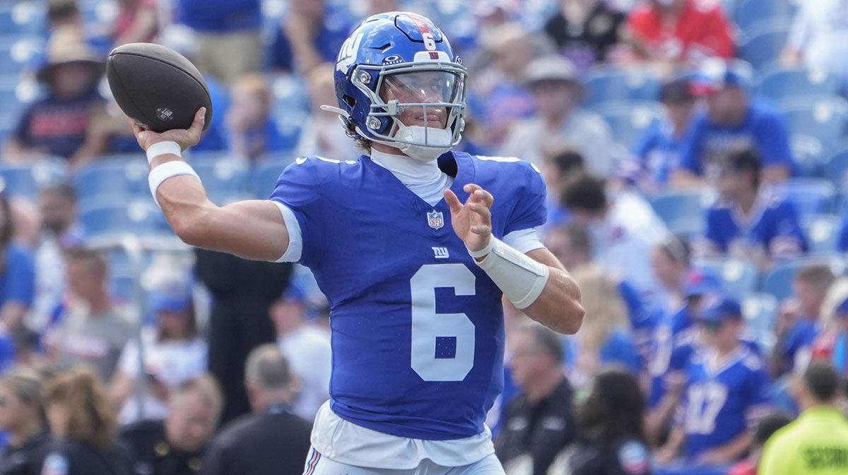 New York Giants quarterback Jaxon Dart (6) warms up prior to the game against the Buffalo Bills at Highmark Stadium.