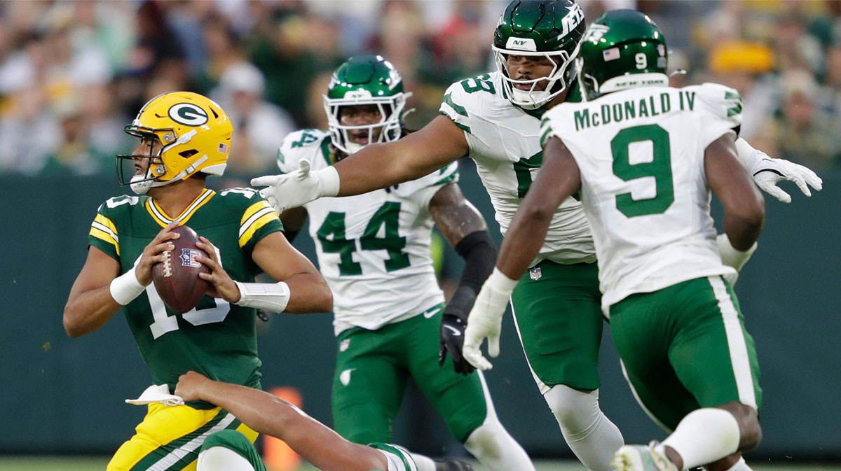 New York Jets defensive tackle Jay Tufele (78) sacks Green Bay Packers quarterback Jordan Love (10) during their preseason game on Saturday, Aug. 9, 2025, at Lambeau Field in Green Bay, Wisconsin.