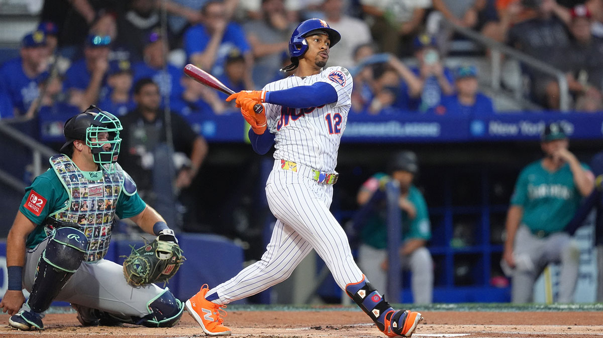 New York Mets infielder Francisco Lindor (12) hits a single against the Seattle Mariners in the first inning at Journey Bank Ballpark at Historic Bowman Field.