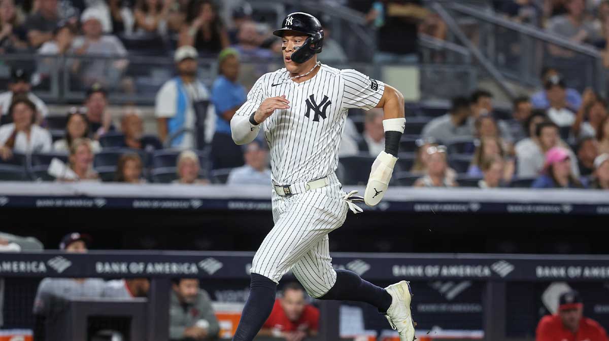 New York Yankees designated hitter Aaron Judge (99) runs to home plate in the fifth inning against the Washington Nationals at Yankee Stadium.
