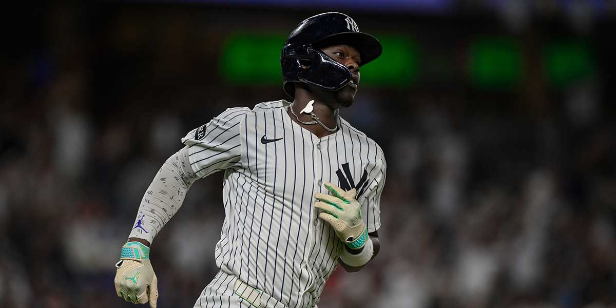 New York Yankees second baseman Jazz Chisholm Jr. (13) runs the bases after hitting a two run home run during the eighth inning against the Boston Red Sox at Yankee Stadium.