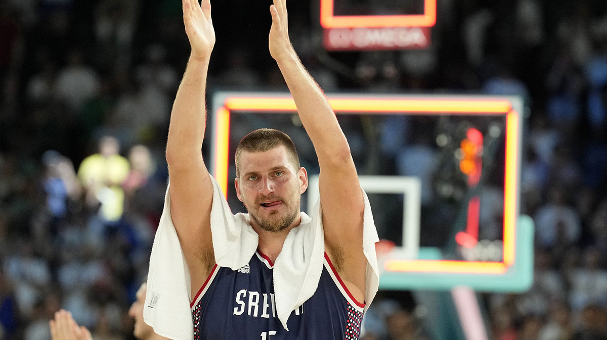 Serbia power forward Nikola Jokic (15) shoots the ball against Germany in the men's basketball bronze medal game during the Paris 2024 Olympic Summer Games at Accor Arena.