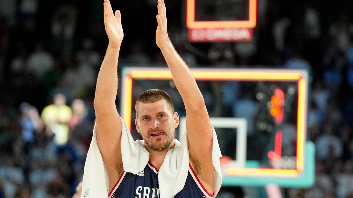 Serbia power forward Nikola Jokic (15) celebrates after their win against Germany in the men's basketball bronze medal game during the Paris 2024 Olympic Summer Games at Accor Arena.