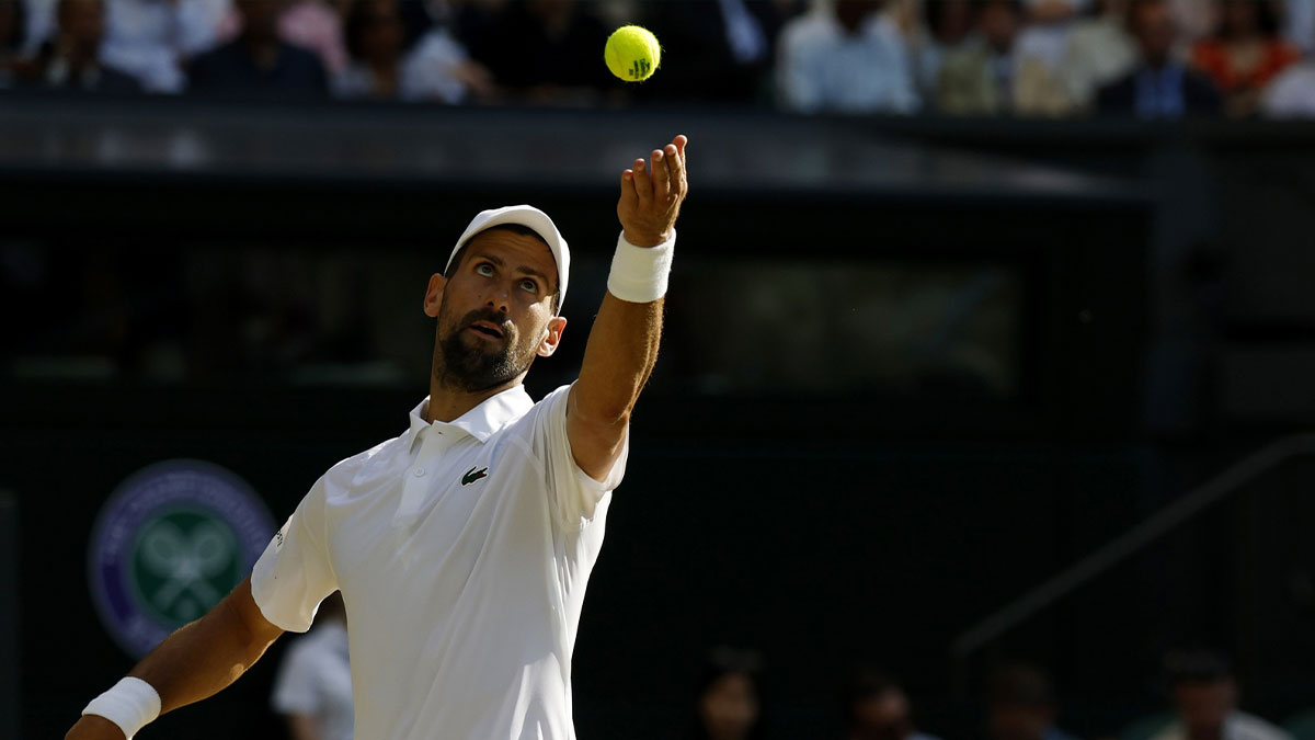 Novak Djokovic (SRB) serves against Jannik Sinner (ITA)(not pictured) in a gentlemen's singles semi-final on day twelve of The Championships Wimbledon 2025 at All England Lawn Tennis and Croquet Club.