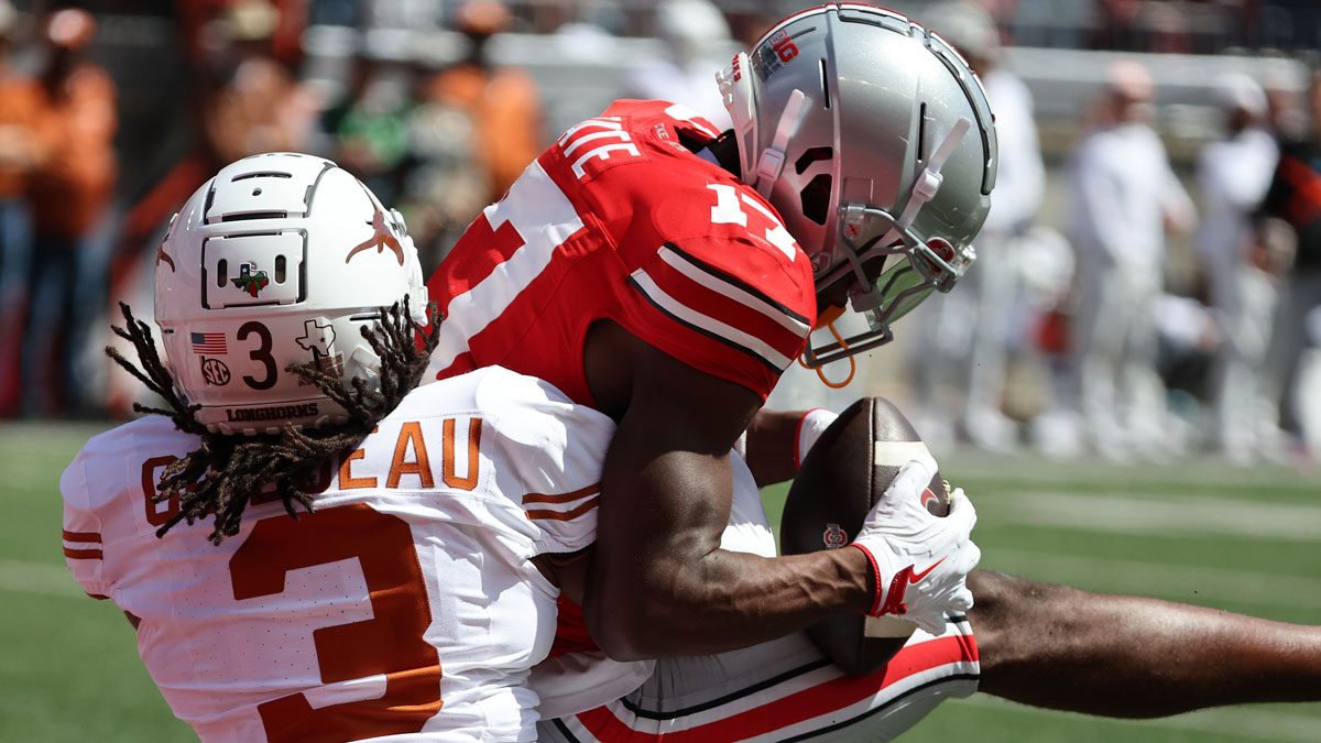 Ohio State Buckeyes wide receiver Carnell Tate (17) makes a catch against Texas Longhorns defensive back Jaylon Guilbeau (3) in the first half at Ohio Stadium.