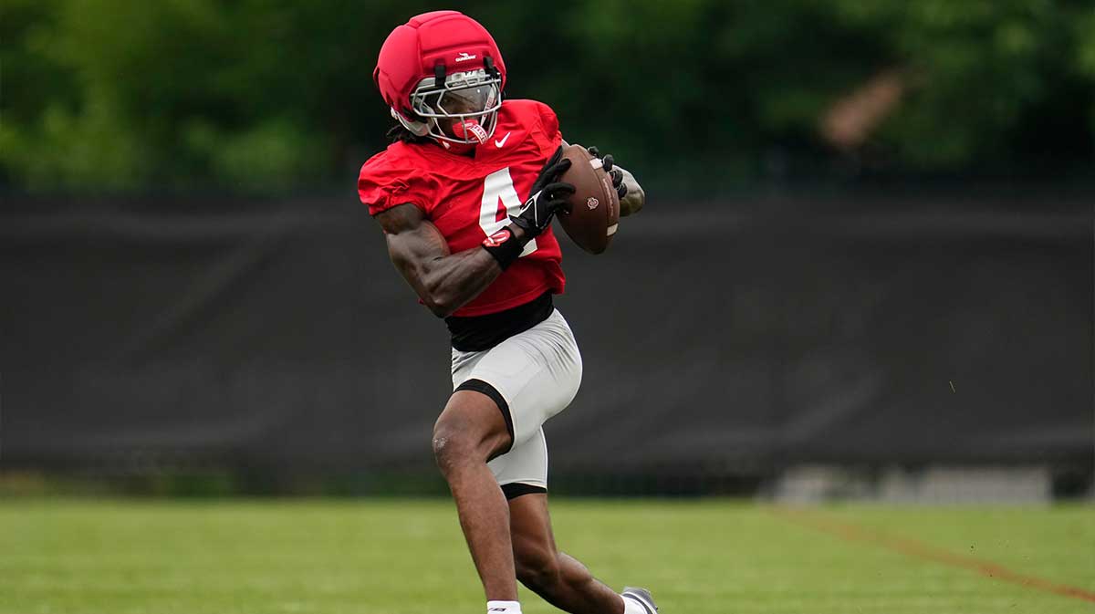 Ohio State Buckeyes wide receiver Jeremiah Smith (4) catches a pass during the first football practice of the season at the Woody Hayes Athletic Center on July 31, 2025.