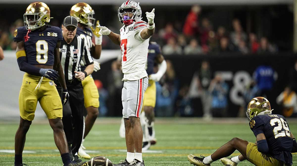 Ohio State Buckeyes wide receiver Carnell Tate (17) points for a first down after a catch against Notre Dame Fighting Irish in the second quarter during the College Football Playoff National Championship at Mercedes-Benz Stadium in Atlanta on January 20, 2025.