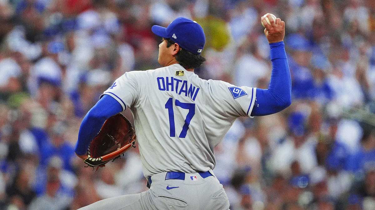 Los Angeles Dodgers two-way player Shohei Ohtani (17) delivers a pitch in third inning against the Colorado Rockies at Coors Field.