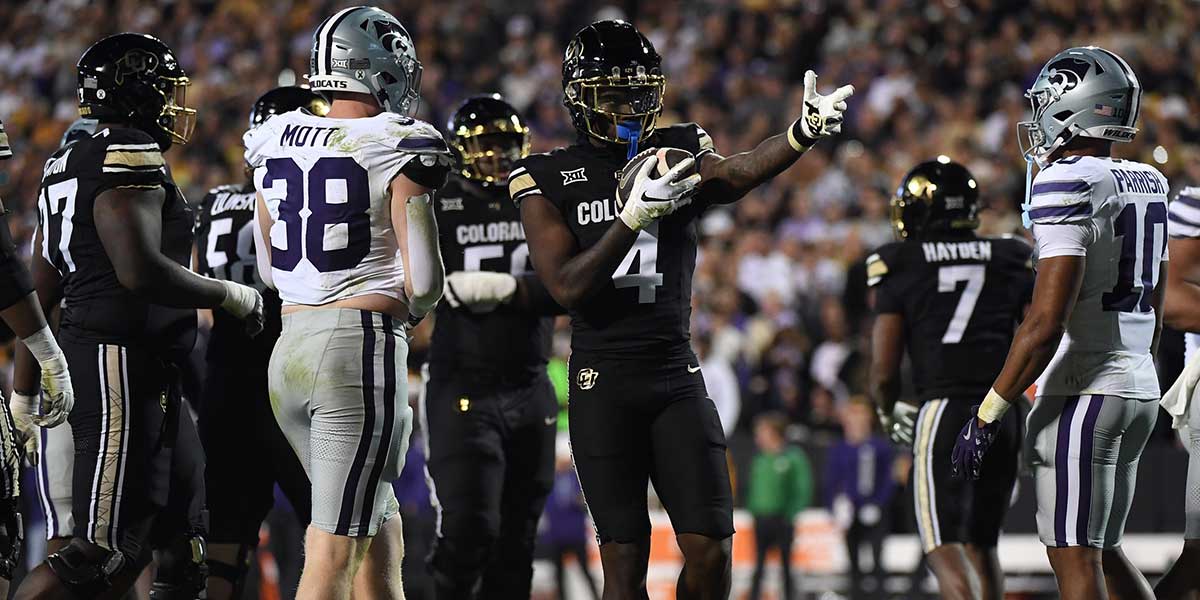 Colorado Buffaloes wide receiver Omarion Miller (4) celebrates after a first down during the second half against the Kansas State Wildcats at Folsom Field. Mandatory Credit: