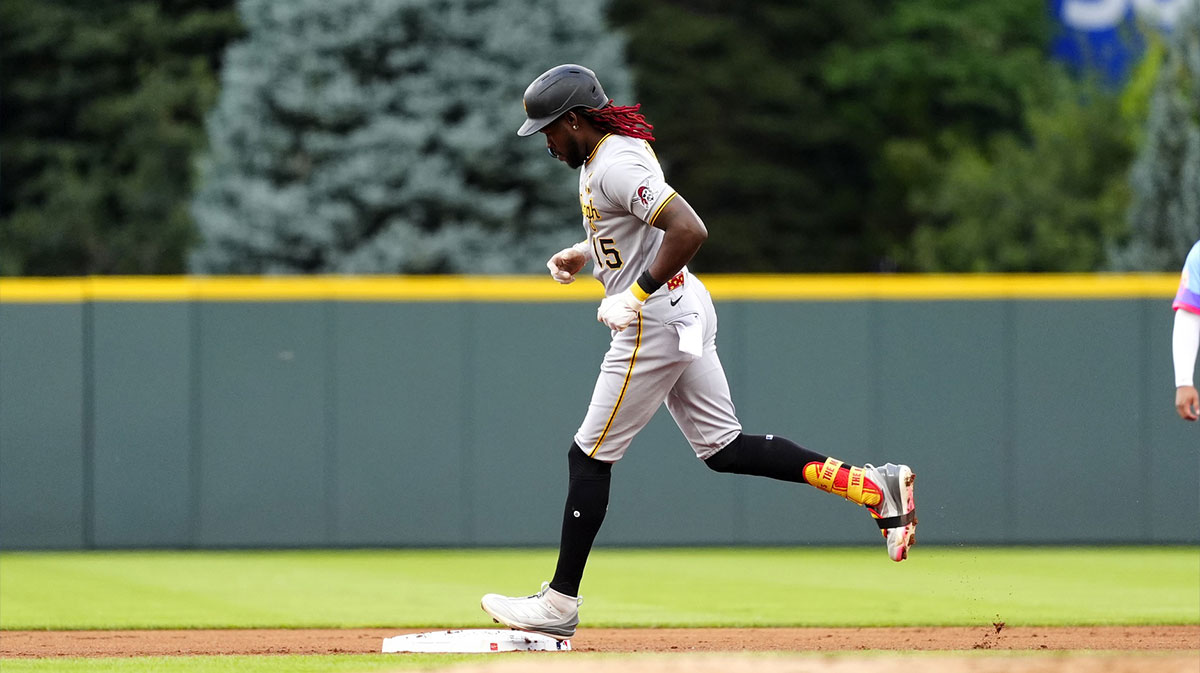 Pittsburgh Pirates center fielder Oneil Cruz (15) runs off a grand slam in the first inning against the Colorado Rockies at Coors Field.