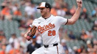 Baltimore Orioles pitcher Trevor Rogers (28) delivers a pitch against the Houston Astros during the third inning at Oriole Park at Camden Yards.