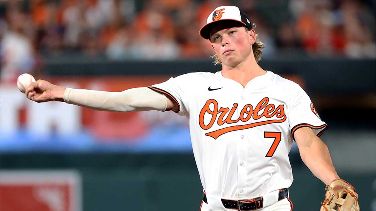 Baltimore Orioles second baseman Jackson Holliday (7) throws to first for an out during the first inning against the Seattle Mariners at Oriole Park at Camden Yards.