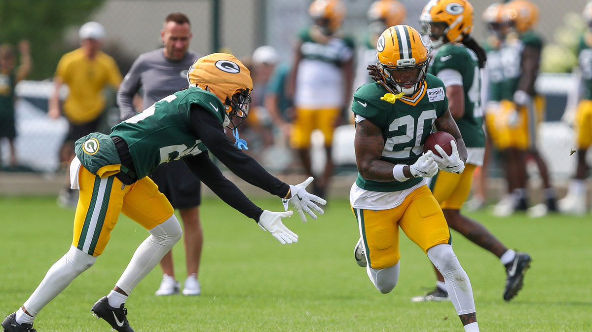 Green Bay Packers defensive backs Keisean Nixon (25) and Javon Bullard (20) run through a pursuit drill during practice on Tuesday, August 12, 2025, at Ray Nitschke Field in Ashwaubenon, Wis.