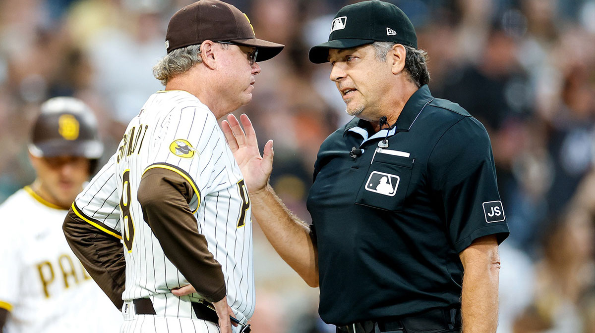 San Diego Padres manager Mike Shildt (8) speaks with home plate umpire James Hoye after being ejected from the game during the second inning against the San Francisco Giants at Petco Park. Mike Shildt blasts league after Xander Bogaerts' home run is overturned in controversial fan interference call, fueling Padres frustrations.