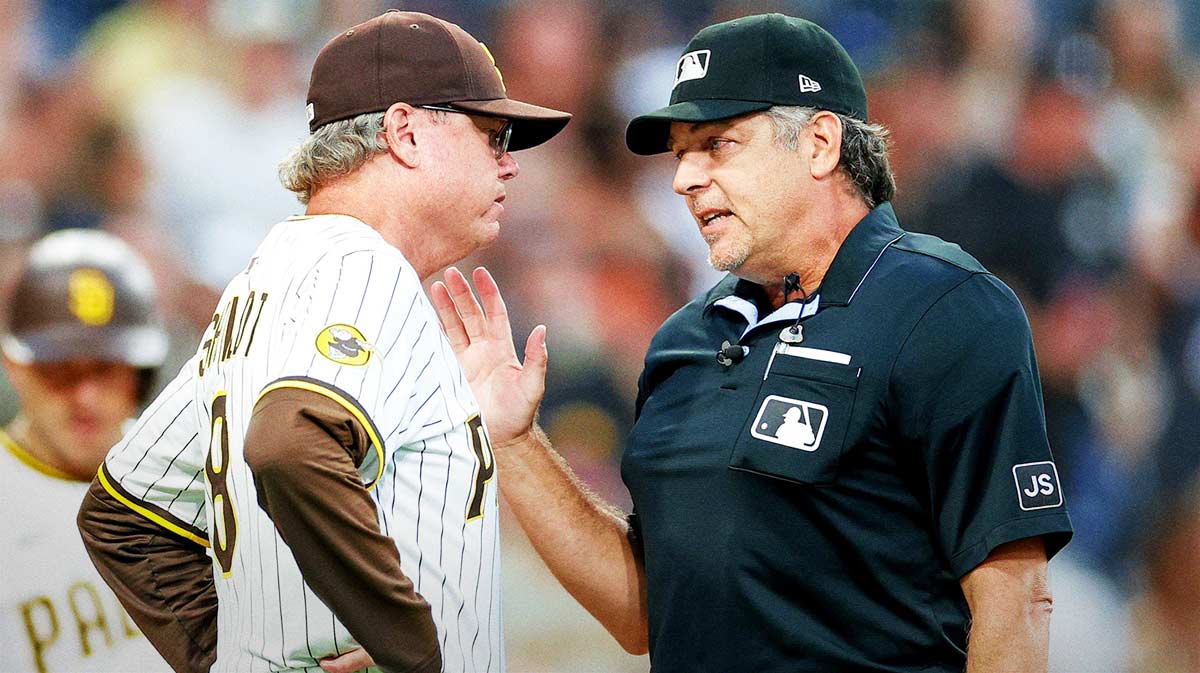 Padres manager Mike Shildt (8) speaks with home plate umpire James Hoye after being ejected from the game during the second inning against the San Francisco Giants at Petco Park