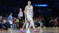 Dallas Wings guard Paige Bueckers (5) celebrates in the second half against the LA Sparks at Crypto.com Arena.