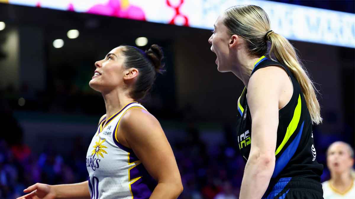 Dallas Wings guard Paige Bueckers (5) yells at Los Angeles Sparks guard Kelsey Plum (10) after scoring during the second half at College Park Center.