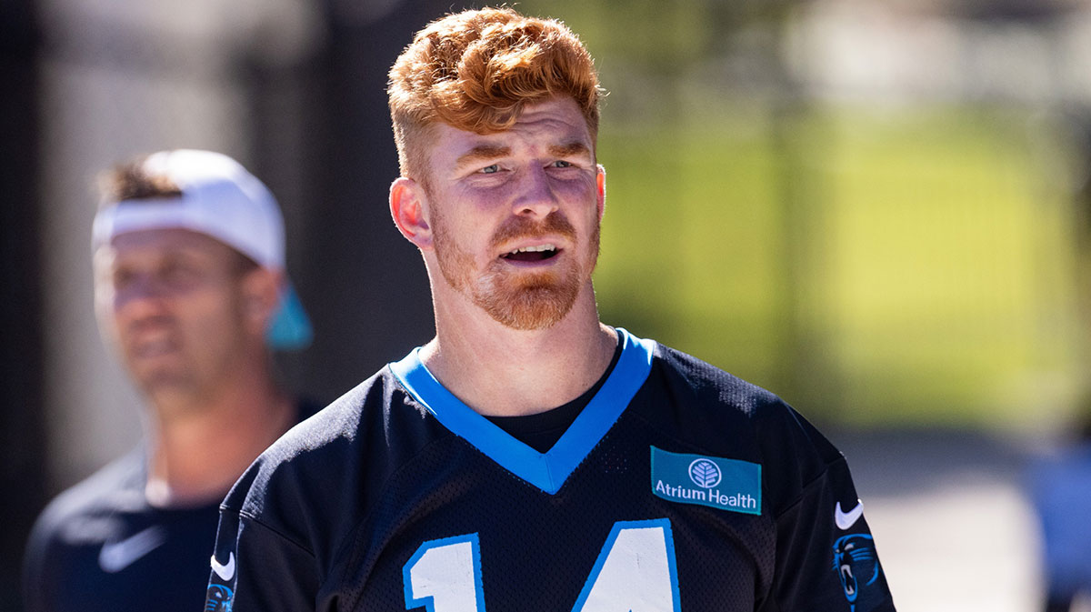 Carolina Panthers quarterback Andy Dalton (14) walks to practice during training camp.
