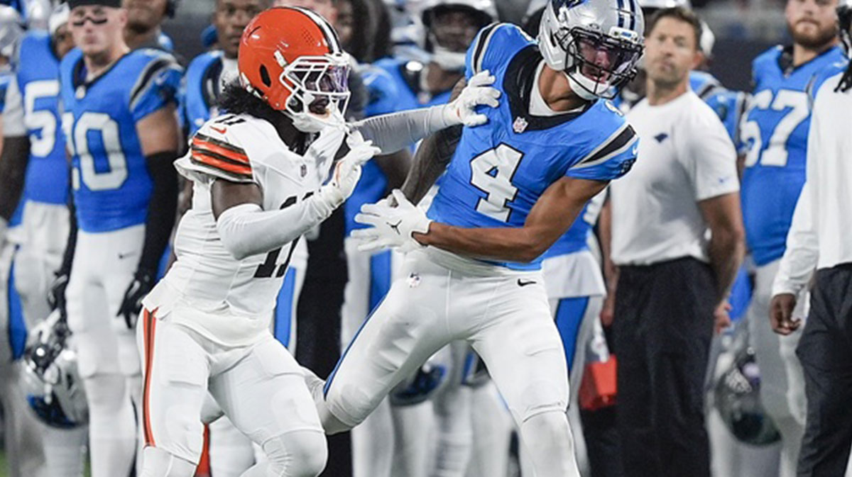 Cleveland Browns cornerback Tony Brown II (11) breaks up a pass for Carolina Panthers wide receiver Tetairoa McMillan (4) during the second quarter at Bank of America Stadium.