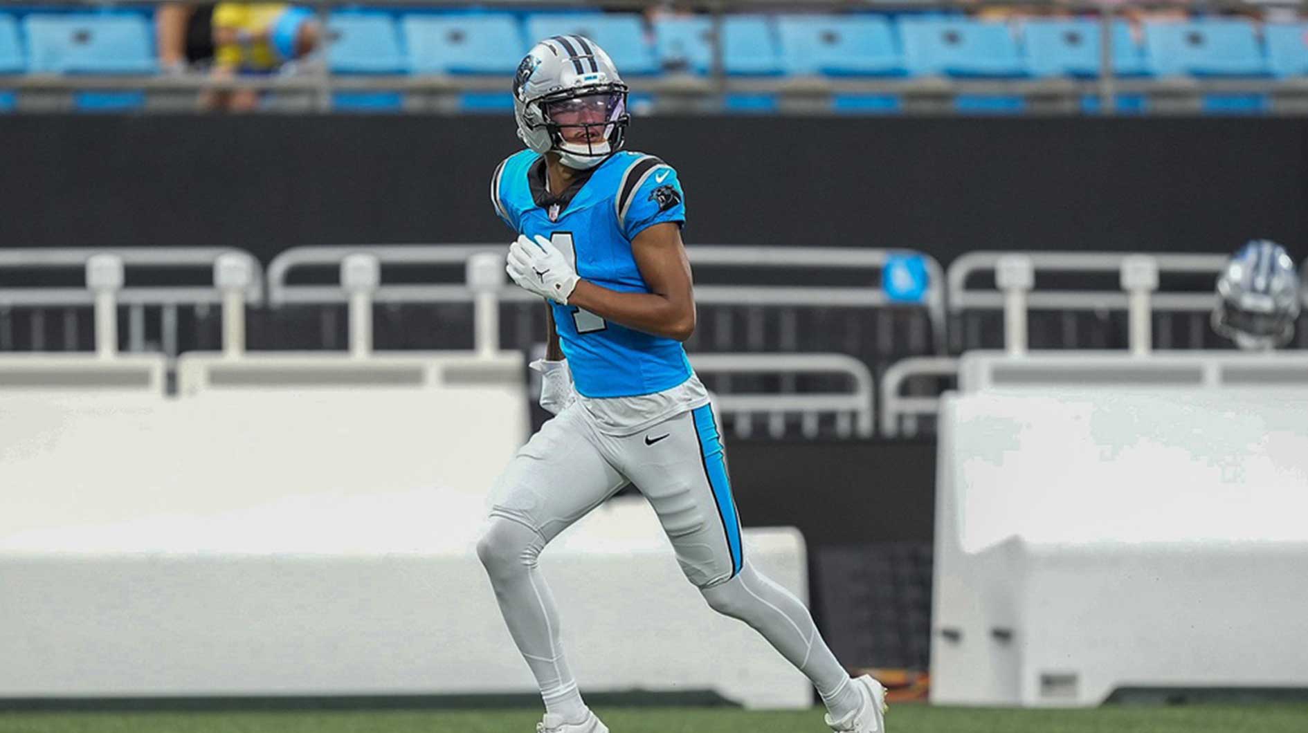 Carolina Panthers wide receiver Tetairoa McMillan (4) runs a pass route during Fanfest at Bank of America Stadium.