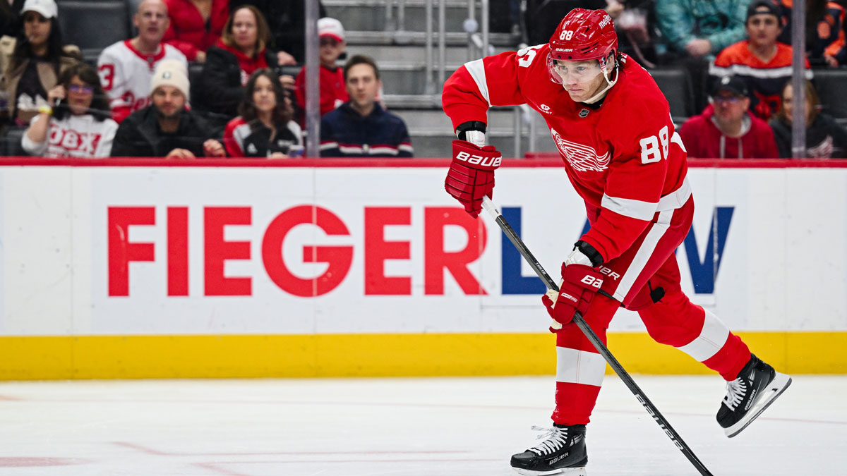 Detroit Red Wings right wing Patrick Kane (88) shoots and scores a goal during the second period against the Carolina Hurricanes at Little Caesars Arena