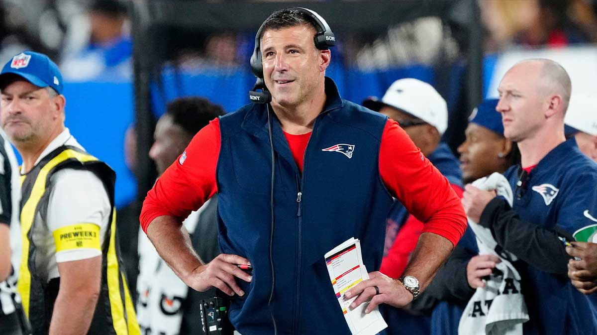 New England Patriots Head Coach, Mike Vrabel is shown on the sideline,