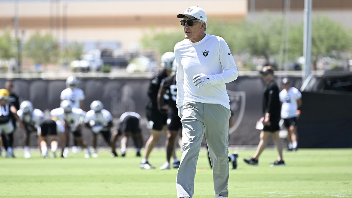 Las Vegas Raiders head coach Pete Carroll runs down the field during Las Vegas Raiders Minicamp at Intermountain Health Performance Center.