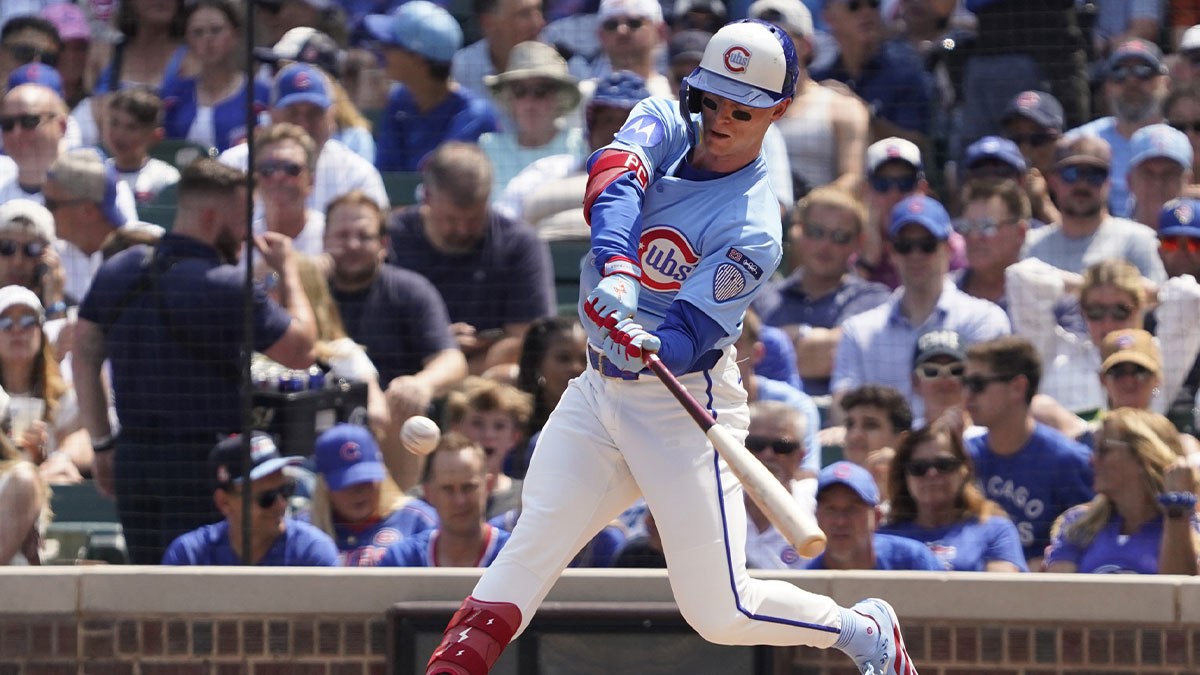 Chicago Cubs outfielder Pete Crow-Armstrong (4) hits a double against the Pittsburgh Pirates during the second inning at Wrigley Field.