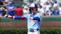 Chicago Cubs outfielder Pete Crow-Armstrong (4) gestures after hitting a double against the Baltimore Orioles during the second inning at Wrigley Field.