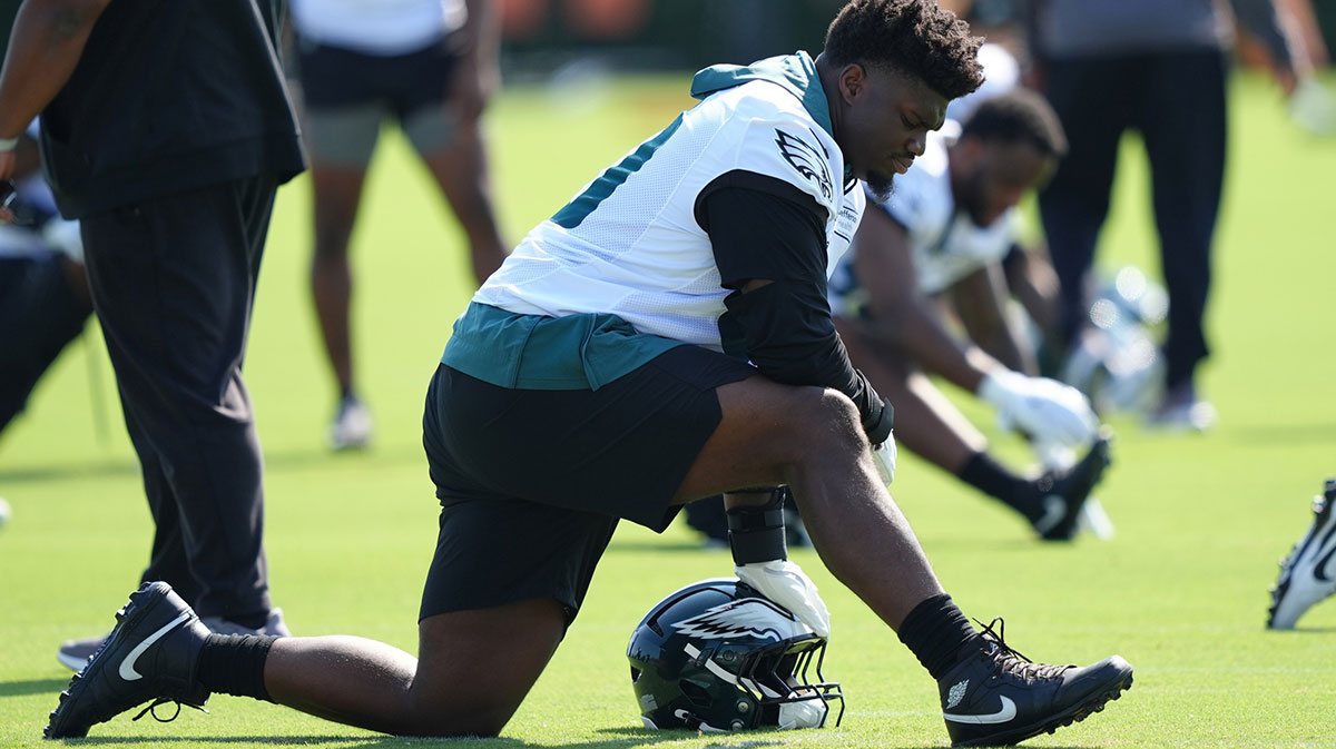 Philadelphia Eagles defensive tackle Jordan Davis (90) warms up during training camp at NovaCare Complex.